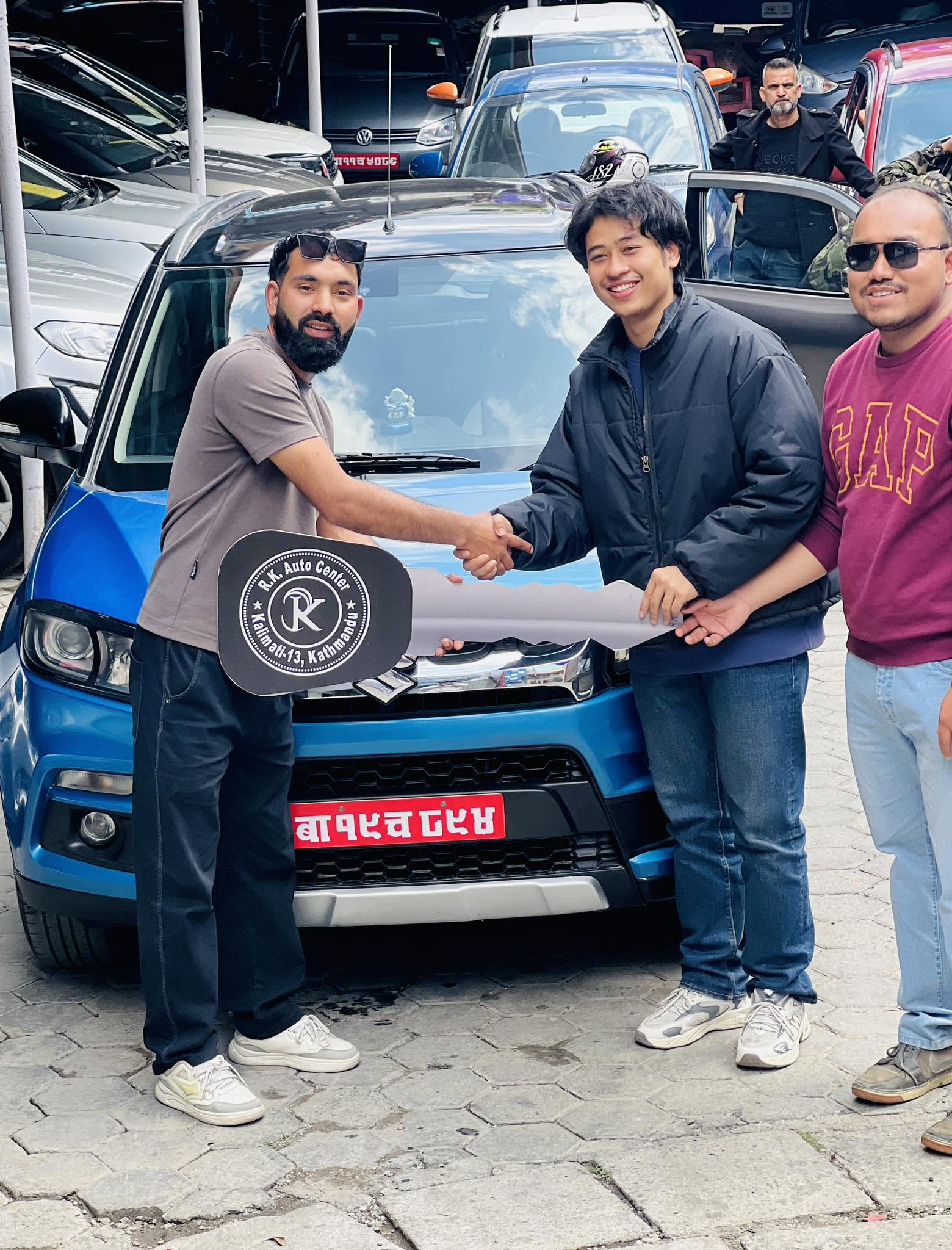 Client posing with their vehicle